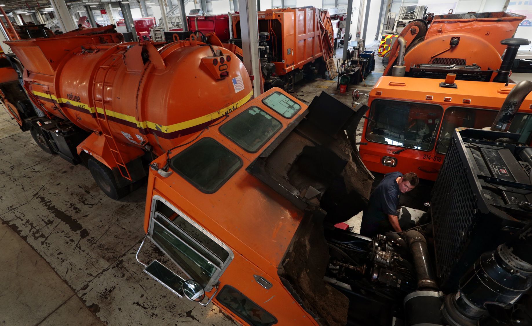 Repairs keep many aging trash trucks off the streets